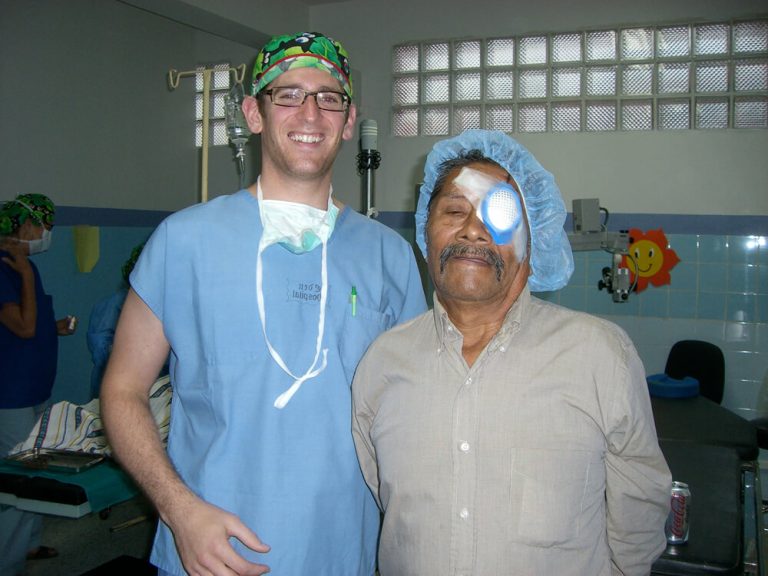 A photo of Dr. Landmann and his patient after a cataract surgery in Guatemala.